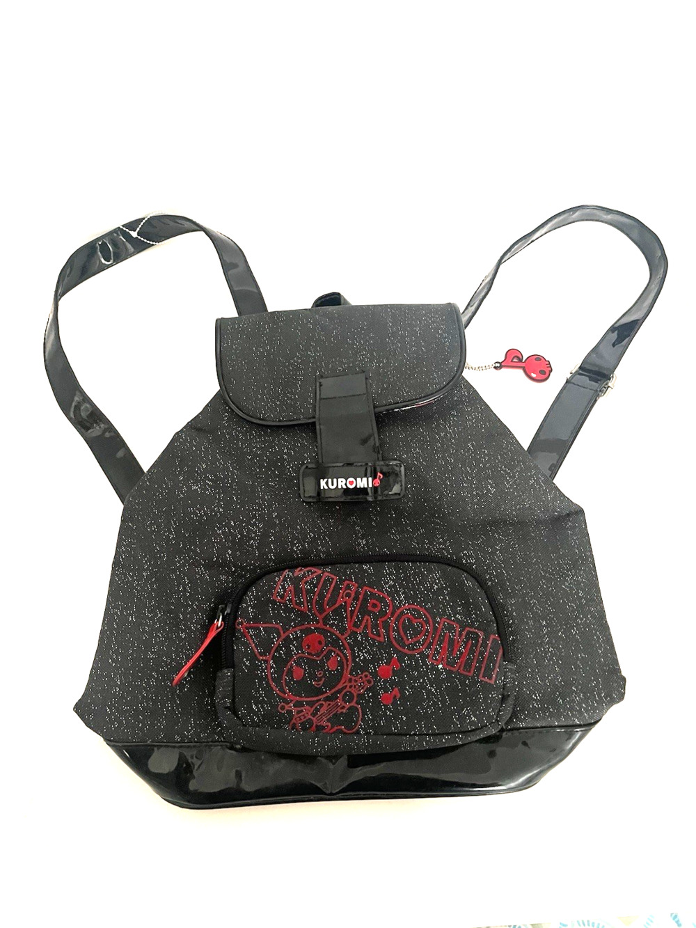 SANRIO KUROMI BACKPACK WITH KEY CHAIN. ON OUTSIDE ZIPPER POUCH AND ONE INSIDE